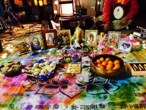 The altar of spiritual guides and teachers at a Bhakti Caravan kirtan